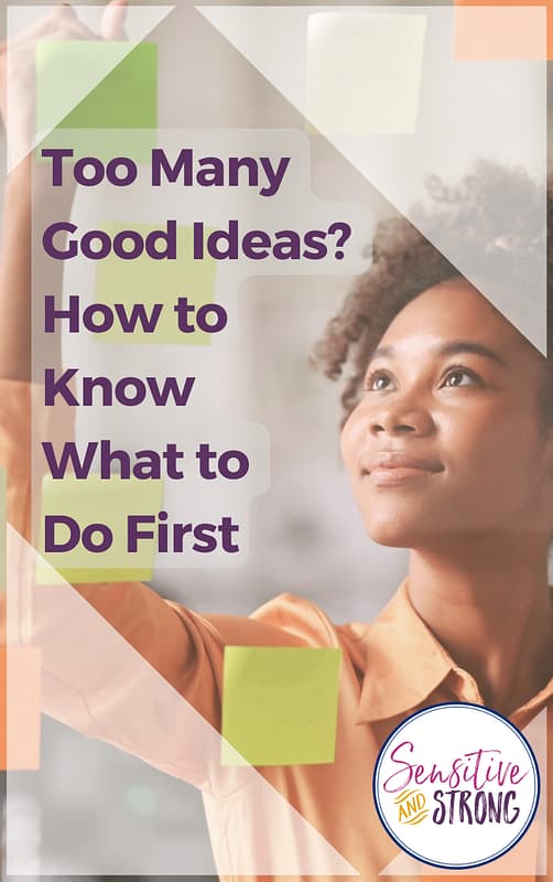 Woman thoughtfully arranging colorful sticky notes, illustrating how to know what to do first when you have too many good ideas.