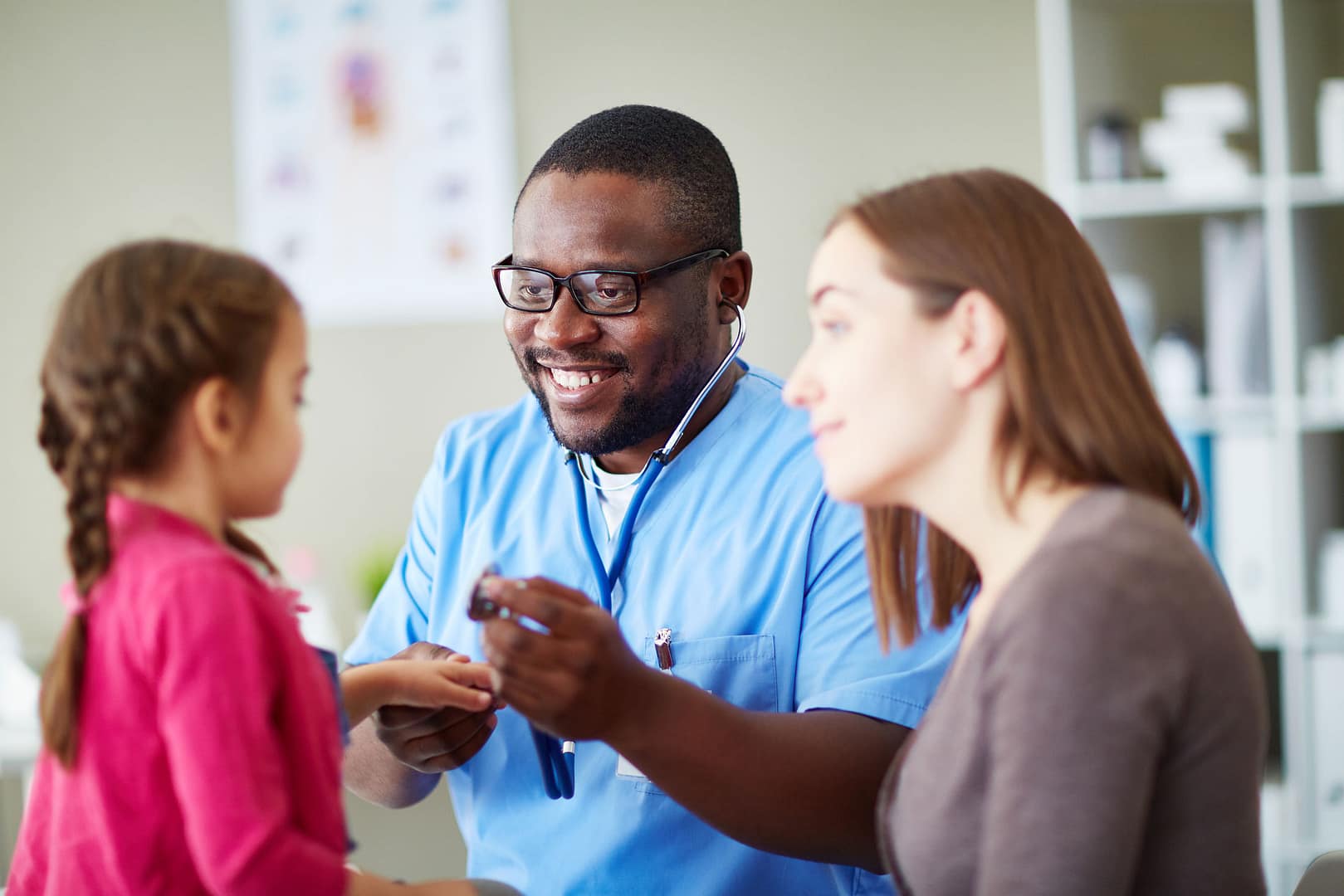 Child-at-a-dr-appt-with-mom