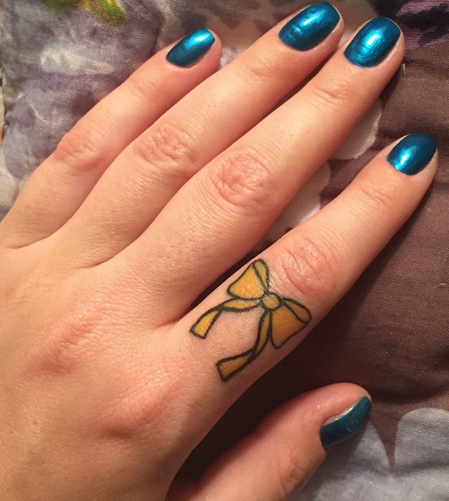 AEG Yellow Ribbon Tattoo